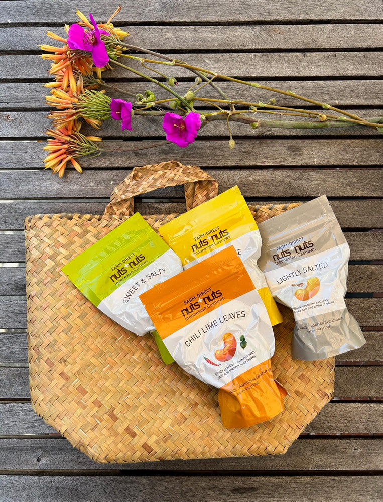 four assorted flavors Indonesian cashews with hand-woven straw tote bag